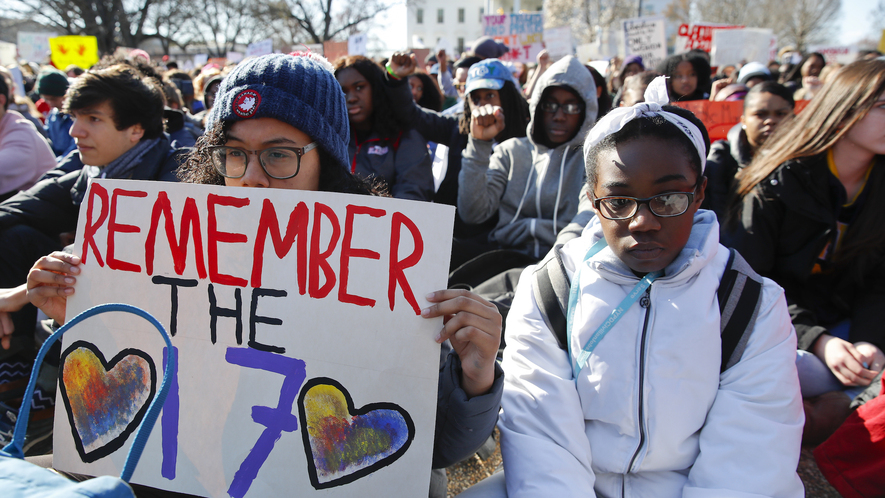 Students sit in silence as they rally in front of the White House in Washington, D.C., March 14, 2018. Student walked out of school to protest gun violence in the biggest demonstration yet of the student activism that has emerged in response to last month's shooting at Florida's Marjory Stoneman Douglas High School. Photo by: AP Photo/Carolyn Kaster
