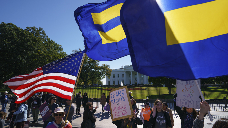 The National Center for Transgender Equality and the Human Rights Campaign gather on Pennsylvania Avenue in front of the White House in Washington, D.C., October 22, 2018, for a #WontBeErased rally. Photo by: AP Photo/Carolyn Kaster